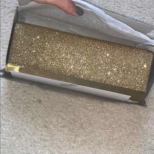 Gold sparkly clutch